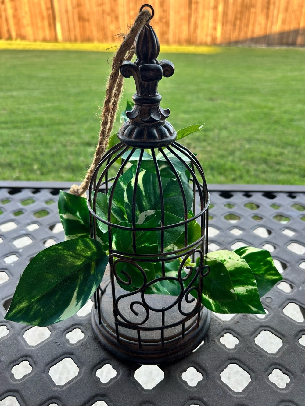 Tiny rustic bird cage with faux greenery 11”